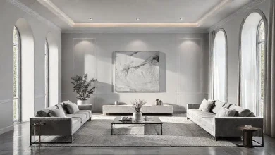 Açık gri tonlarında modern ev dekorasyonu, şık ve minimalist bir oturma odası iç mekanı.